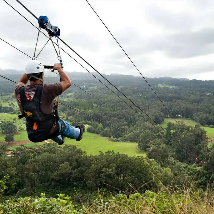 Thrilling zip-line ride through the forest at Zacs Valley